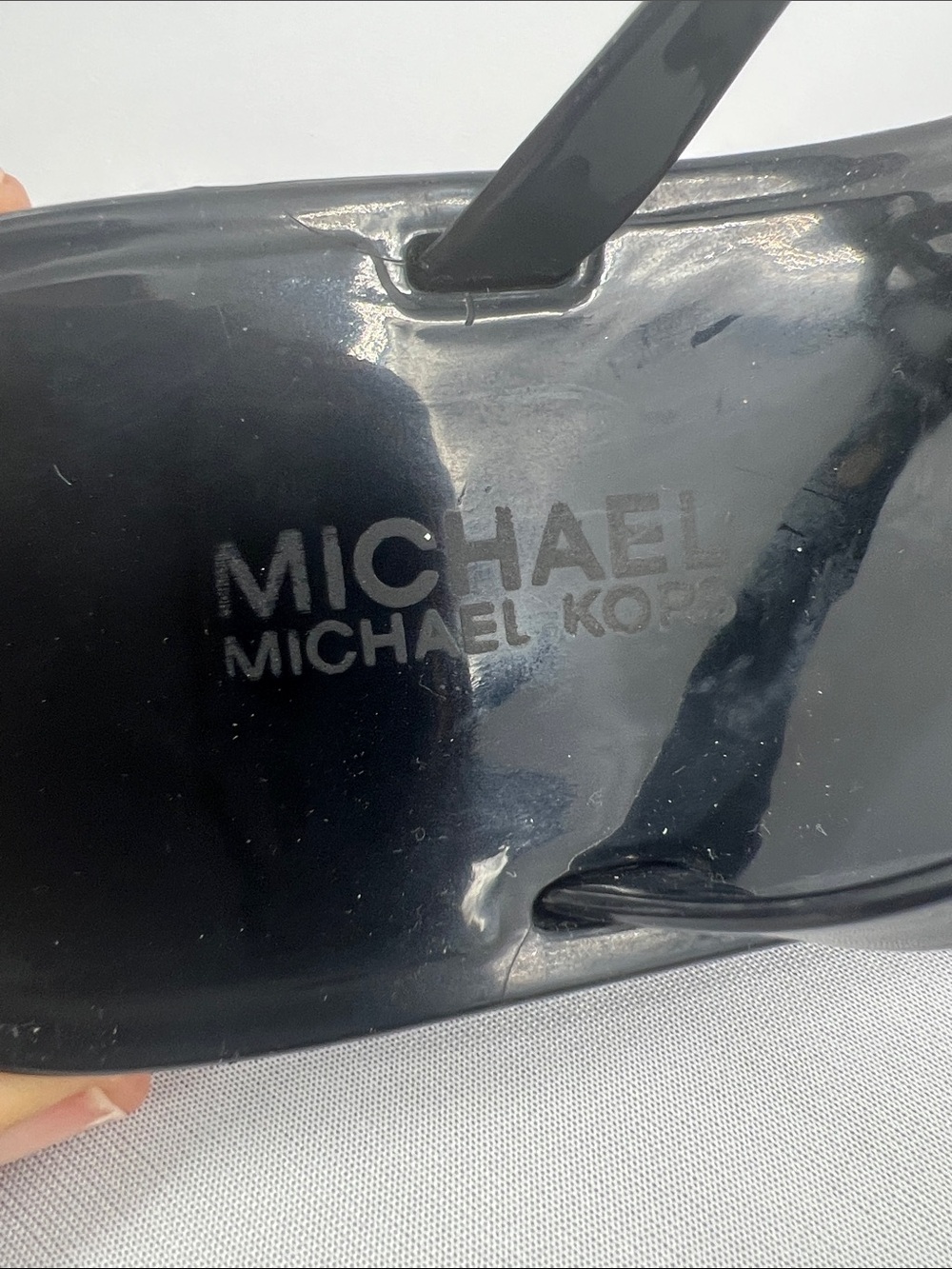 Michael Kors Black Gloss Jelly Logo Thong Sandals with Gold Accents - Picture 3 of 6